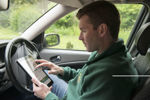 OFTEC registered technician accessing the OFTEC website via a tablet 